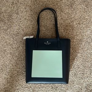 Brand new with tags Kate Spade bag.